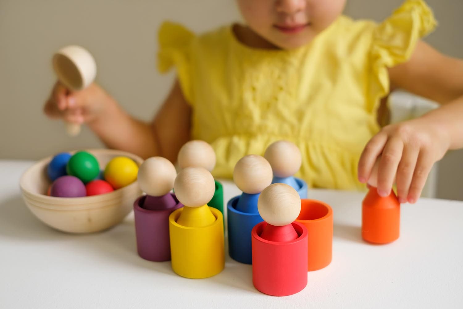Coloured toy for learning colours and developing logic of preschoolers.